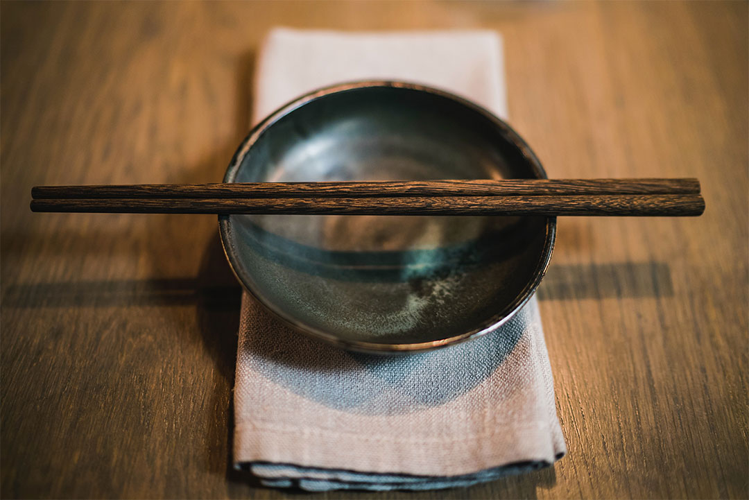 chopsticks on a plate