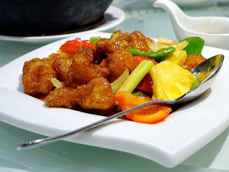 plate of breaded chicken mixed with vegetables