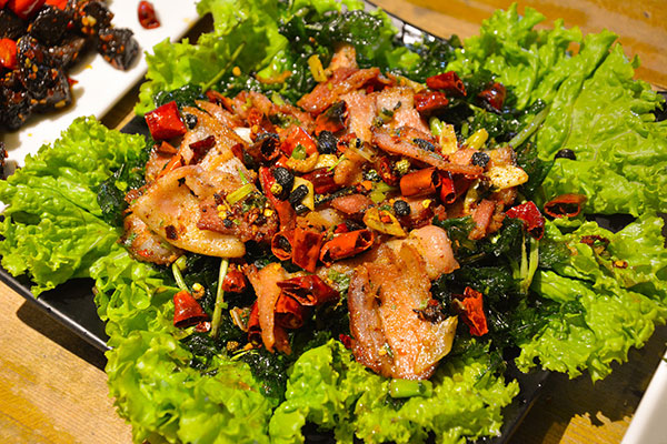 Hunan chicken on a bed of lettuce